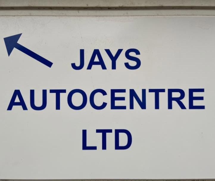 The Jays Autocentre Ltd sign with an arrow